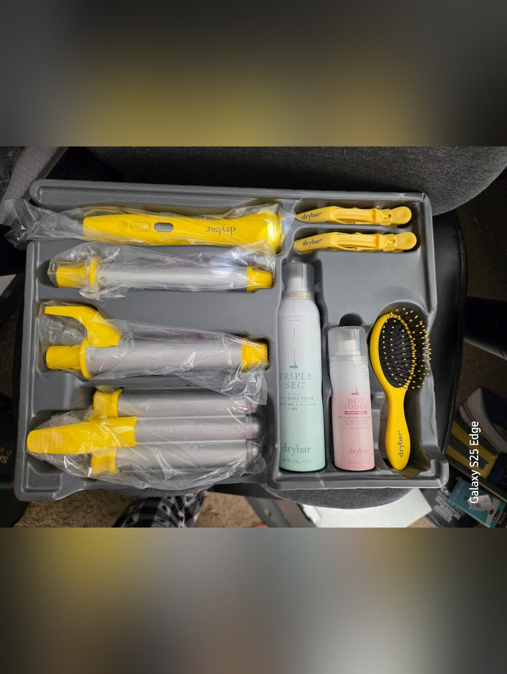 Drybar Hair Styling Set in Yellow and Silver With Hair Products.